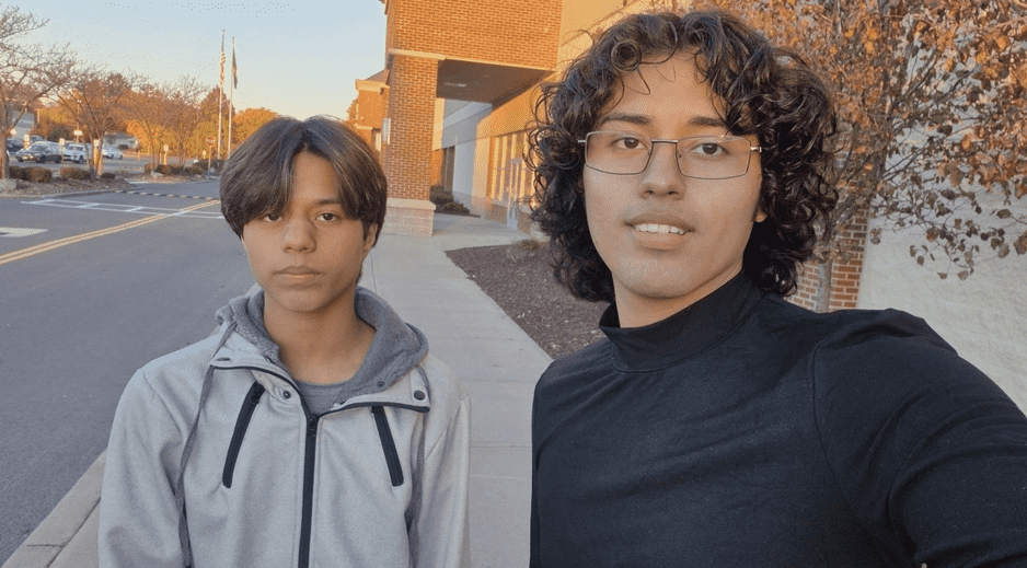 osué Alvarado, right, poses for a photo with his younger brother Israel.