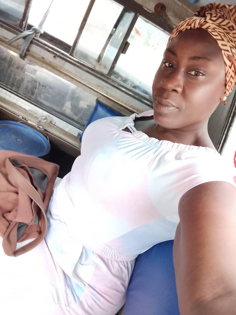 Johane Morel, who was deported from Florida to Haiti, where she hadn't lived since childhood and doesn't speak the language, poses for a selfie in Cap-Haïtien, Haiti.