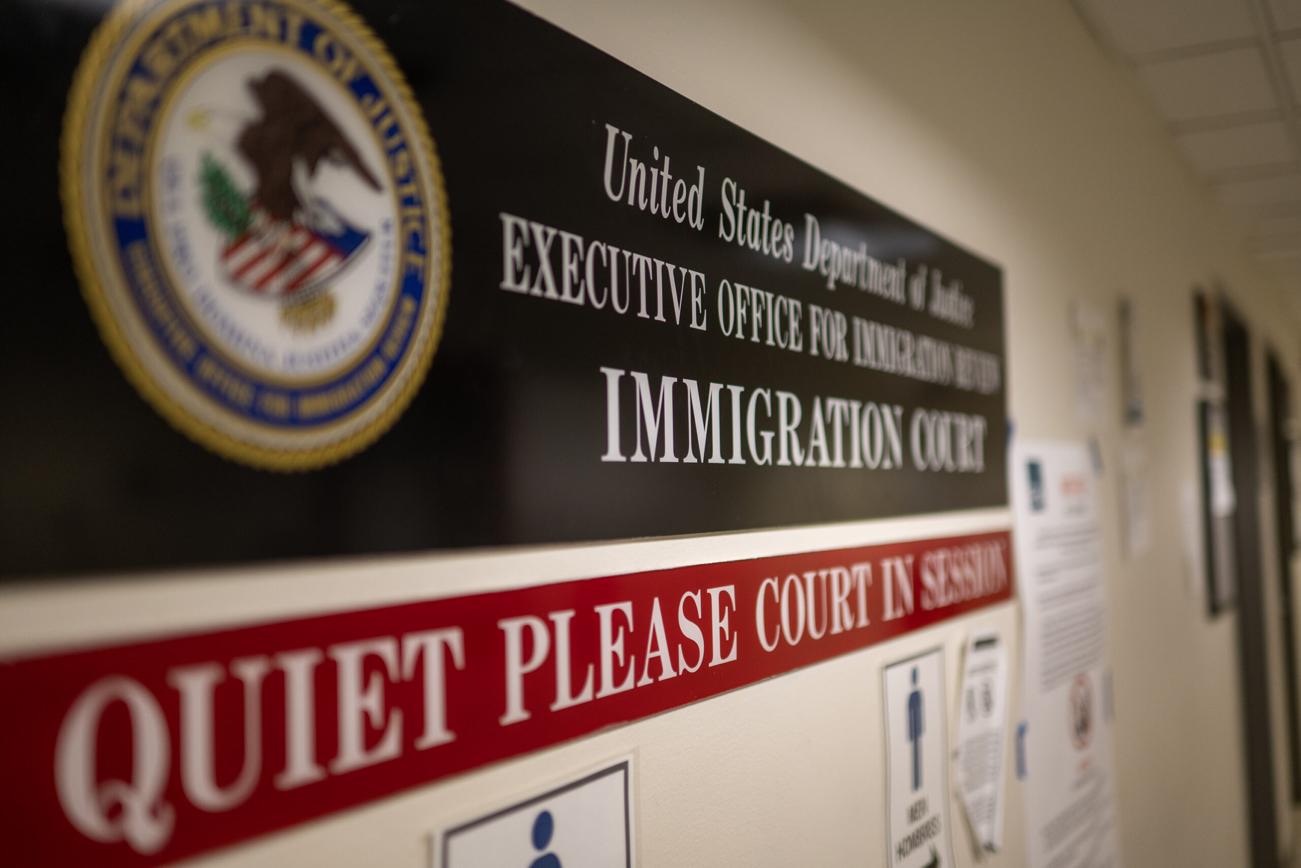Signage inside immigration court at Federal Plaza in New York City.