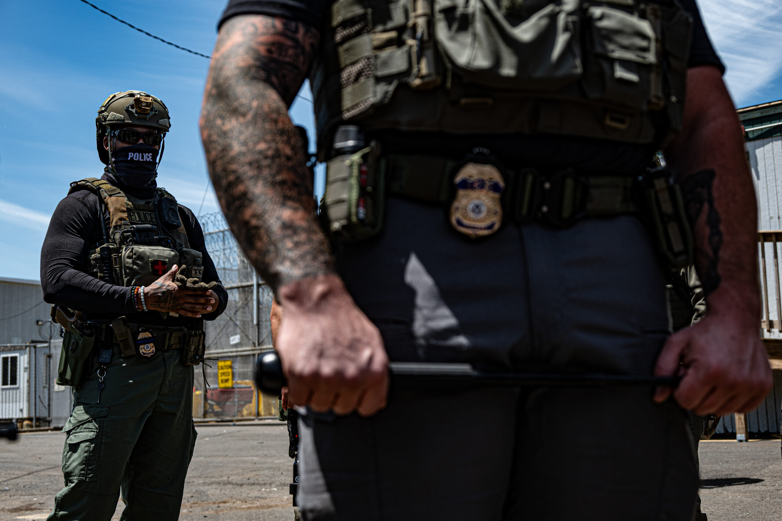 ICE agents observe a protest outside Delaney Hall detention center in Newark, N.J., on May 27, 2026.