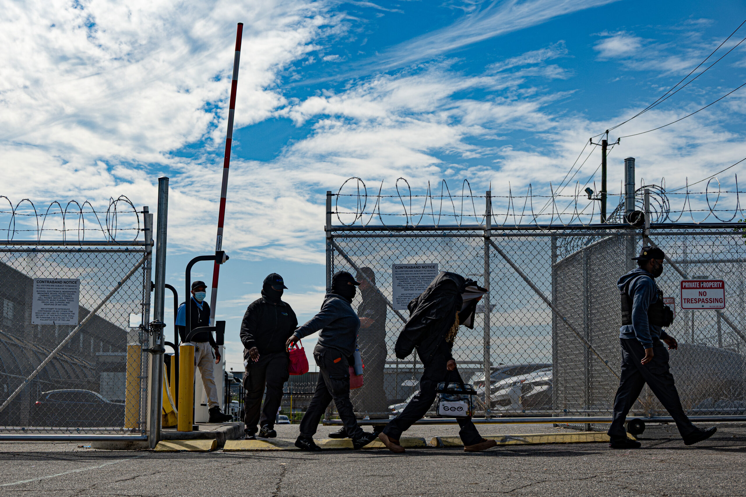 GEO Group employees exit Delaney Hall detention center in Newark, N.J., on May 26, 2026. Workers at the facility have been accused of using chemical agents on detainees and failing to provide adequate medical care, with allegations including a miscarriage and widespread infections inside the 1,000-bed facility.