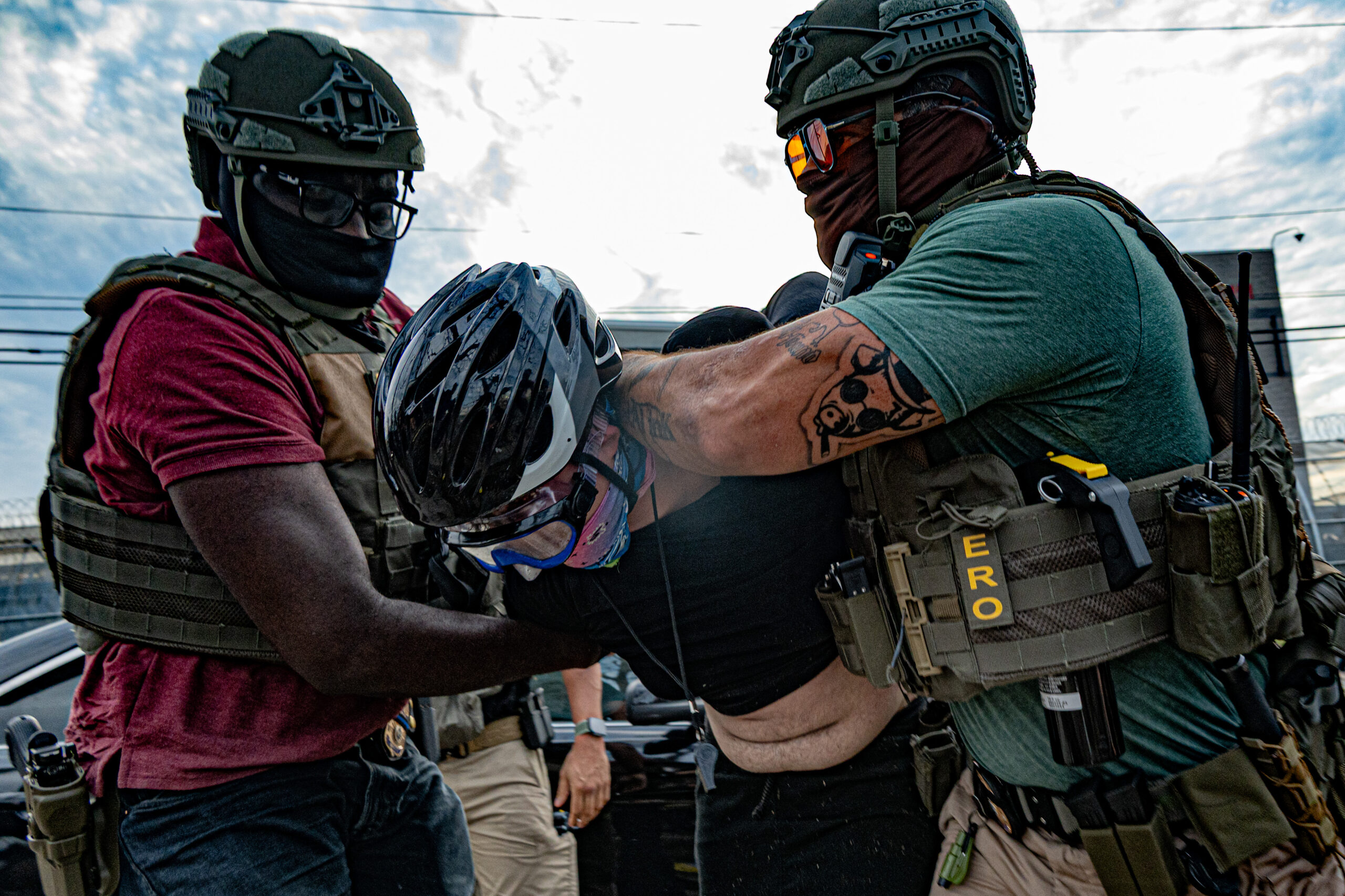 Federal agents detain a protester after demonstrators attempted to block vehicles from leaving Delaney Hall detention center, sparking skirmishes in Newark, N.J., on May 26, 2026.
