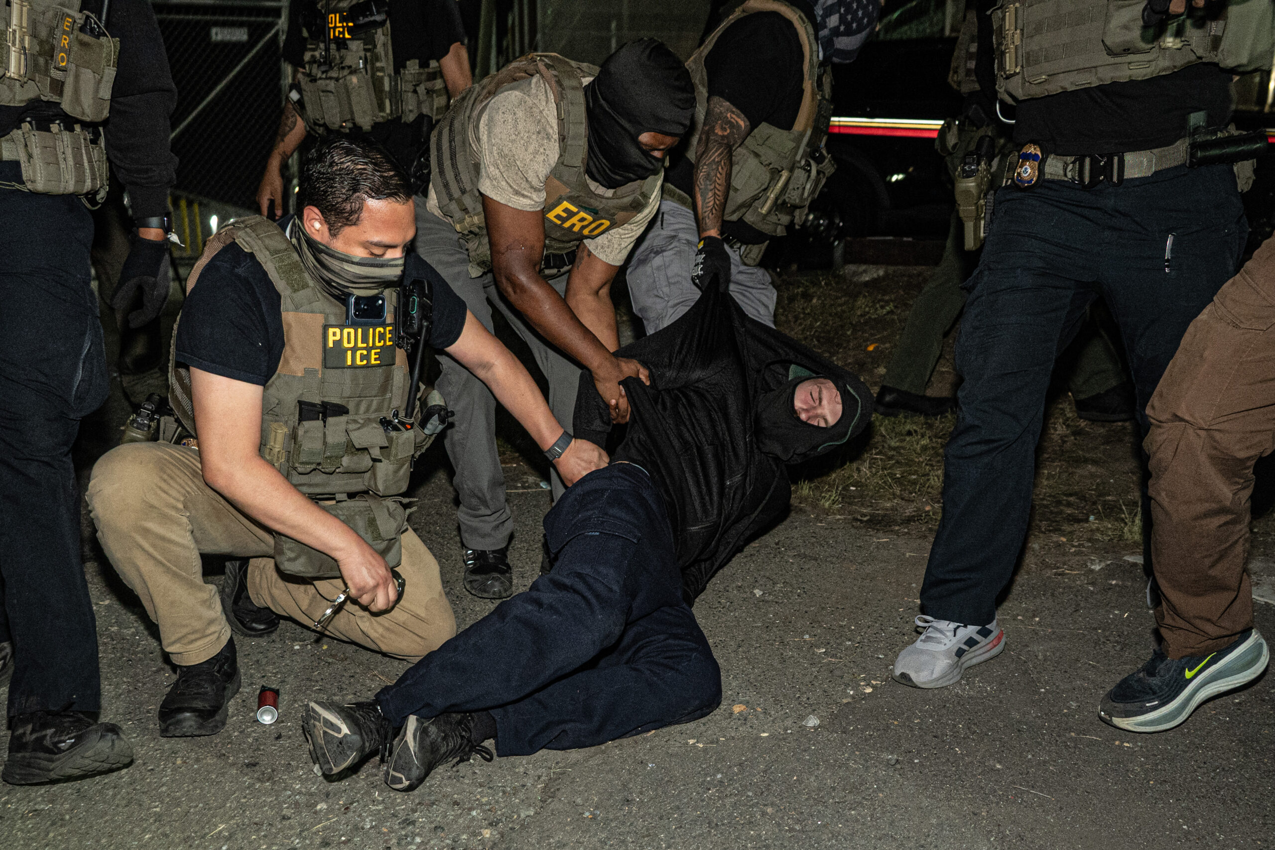 Confrontations between federal agents and protesters intensified outside Delaney Hall detention center in Newark, N.J., on May 27, 2026, after a protester was pushed beneath a moving tractor-trailer, leading to additional detentions.