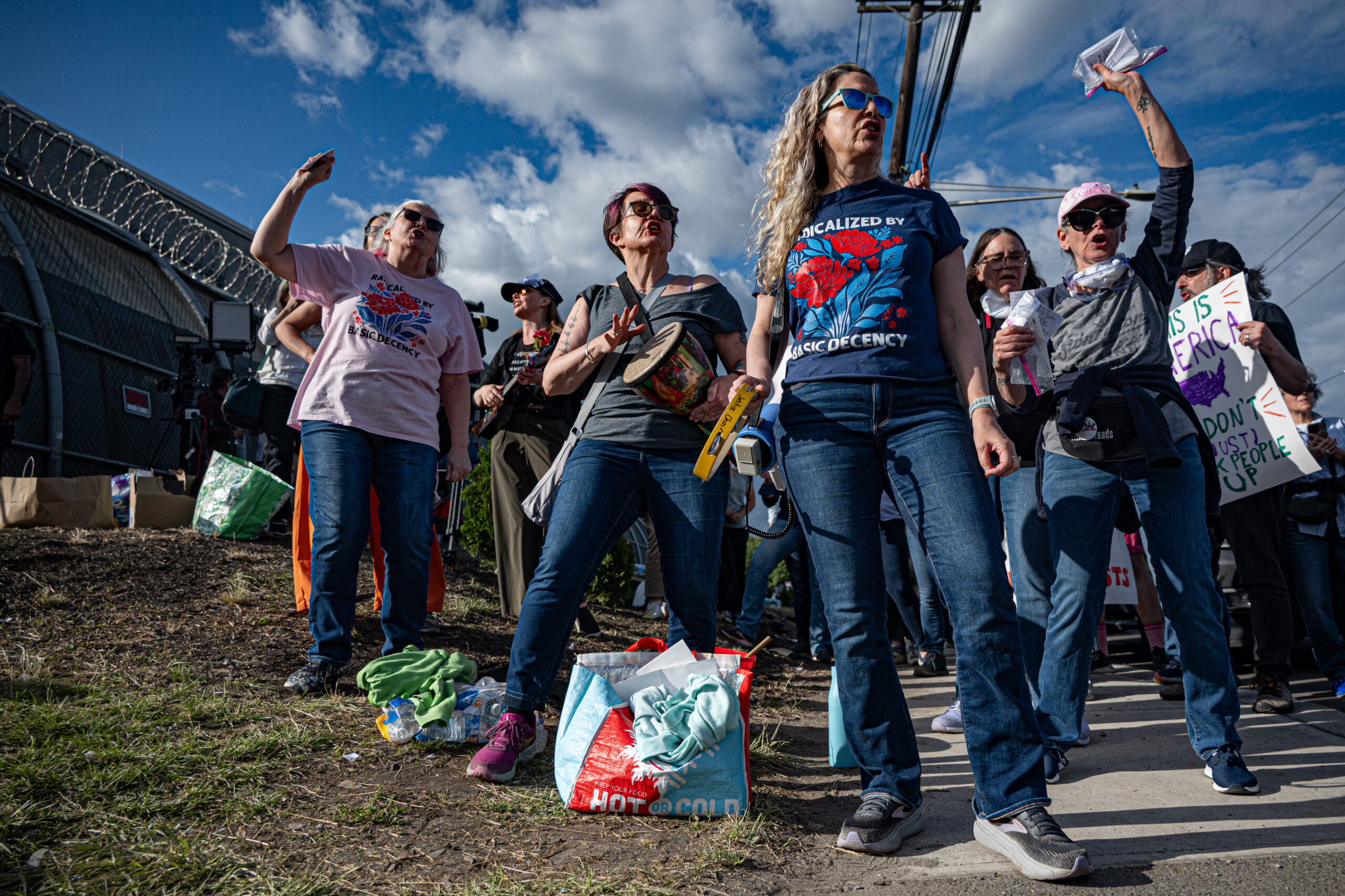Protesters sing outside Delaney Hall detention center in Newark, N.J., on May 28, 2026, urging ICE agents to reconsider their actions at the facility.