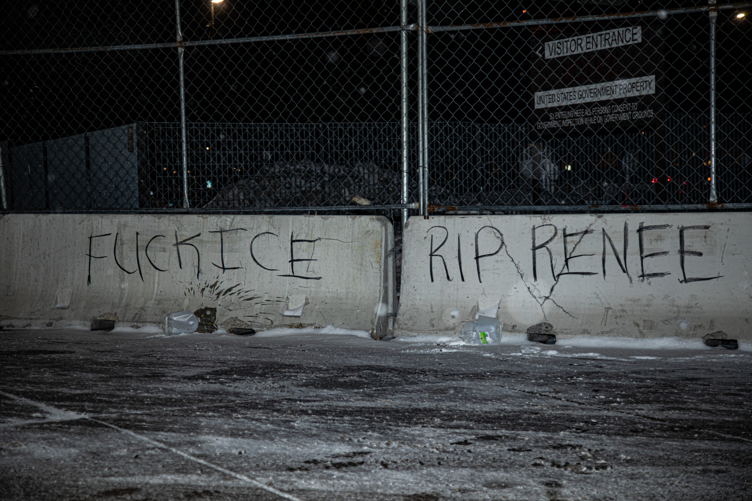Profanities and messages grieving the killing of Renee Good are vandalized onto barricades in front of the Whipple Federal Building in Fort Snelling, Minn., Jan. 16, 2026.